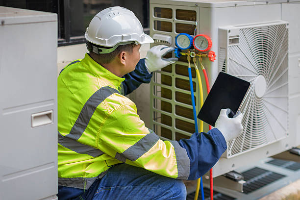 Professional Hvac technician working in Ithaca, MI